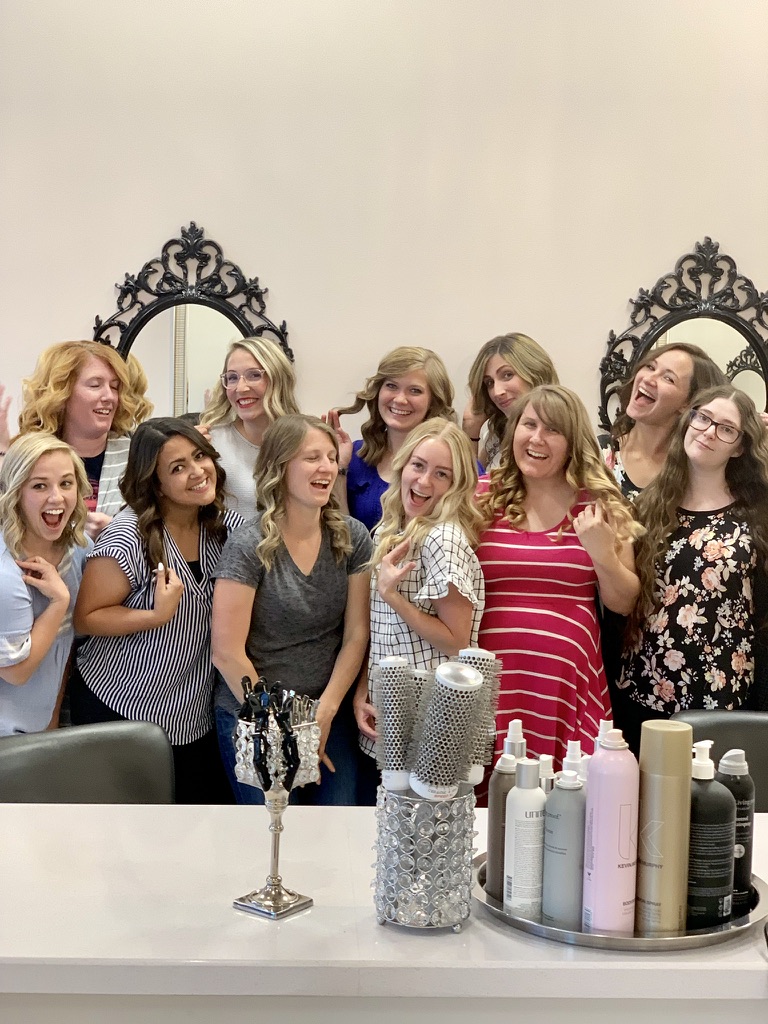 Friends enjoying a group salon celebration