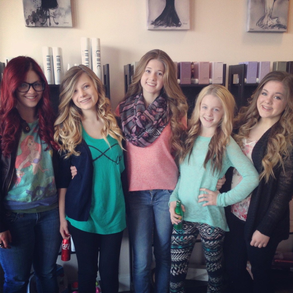 Teen guests showing their styled hair at pro Do