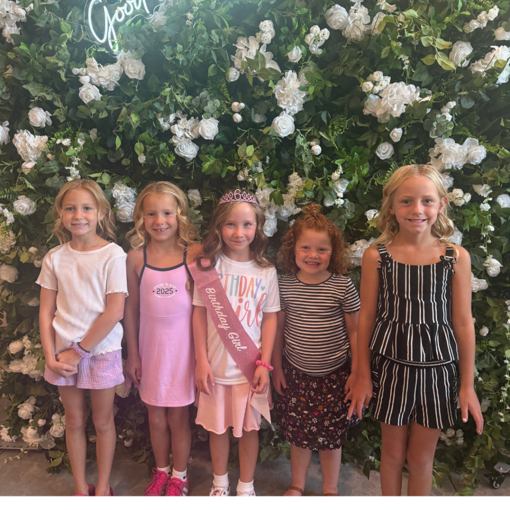 Five girls posing together at a Lil Glam birthday party at pro Do Blow Dry Bar Description: